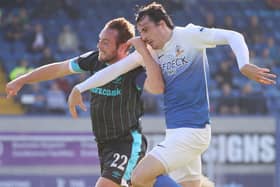 Linfield's Jamie Mulgrew (left) battling in Lurgan with Danny Wallace of Glenavon. Pic by Pacemaker.