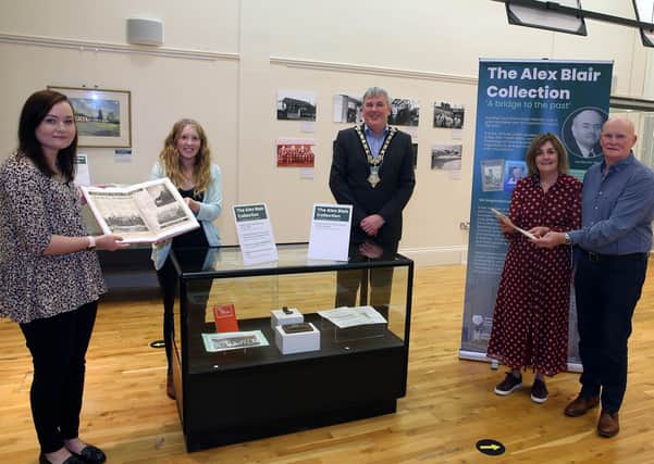 The Mayor of Causeway Coast and Glens Borough Council, Councillor Richard Holmes pictured at the Ballymoney Museum exhibition showcasing the personal collection of Alex Blair (1941-2018) with Museum Assistant Rachel Archibald, Museum Officer Jamie Austin, and representatives of Alex's family, Elaine Lee and William Lee