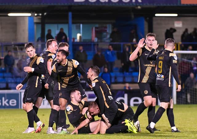 Larne celebrate Andy Mitchell's goal during last night's game at Mourneview Park.
Photo Andrew McCarroll/ Pacemaker Press