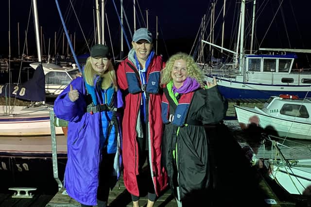 Portadown woman Andrea Judge with Lurgan woman Alison O'Hagan and Lauren O'Malley, originally from Boston but now living in Camlough. The trio swam the length of Lough Neagh in a relay completing the feat in 12 hours and three minutes.