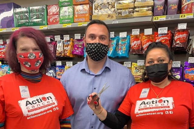 To raise money for SuperValu’s charity partner Action Cancer, staff member Linda Mitchell (left) from the Moira store gets ready to get her head shaved by Meena Poole (right). They are joined by store owner Jamie Poole