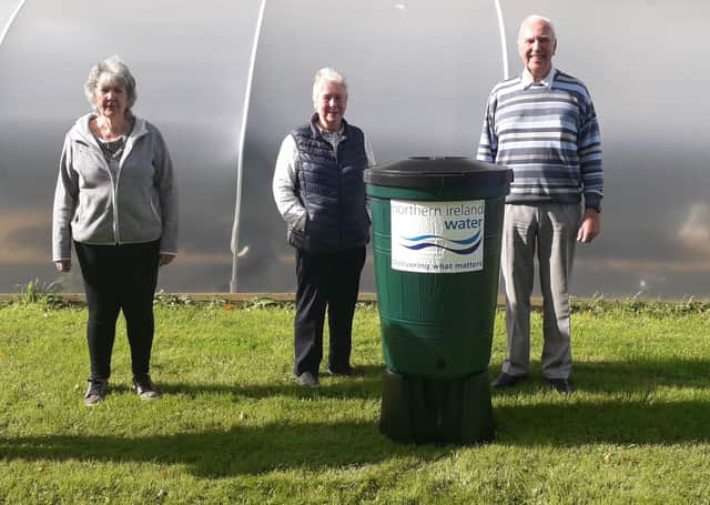 Pictured are Stoneyford community residents with their new Waterbutt