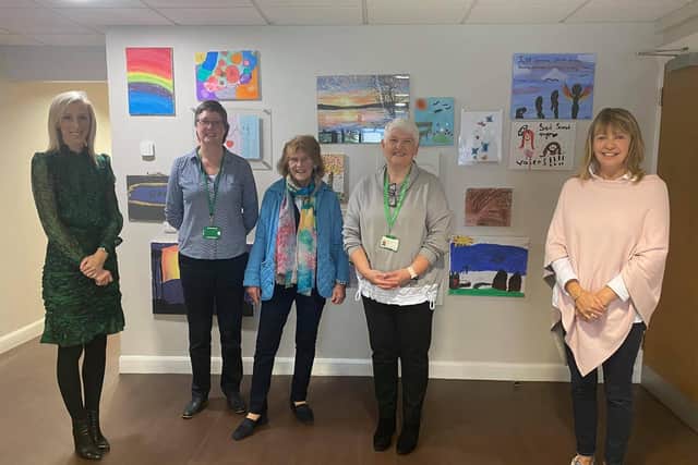 Upper Bann MP Carla Lockhart with her DUP party colleague Cllr Margaret Tinsley at with some NSPCC staff who work at the Craigavon centre. It is due to close at the end of October.