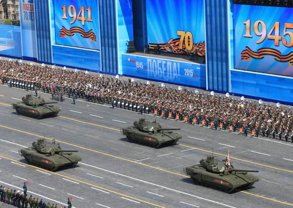 T-90A main battle tanks during the military parade to mark the 70th anniversary of victory in the 1941-1945 Great Patriotic War, May 9, 2015 in Moscow, Russia. The Victory Day parade commemorated the end of the Second World War in Europe. (Photo by Host photo agency / RIA Novosti via Getty Images)