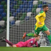 Joe Gormley heads off to celebrate finding the net last night for Cliftonville in a 1-1 draw with Linfield. Pic by PressEye Ltd.