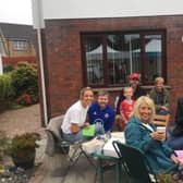 Residents at Corran Manor enjoy the coffee morning for Macmillan Cancer Support.