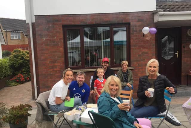 Residents at Corran Manor enjoy the coffee morning for Macmillan Cancer Support.