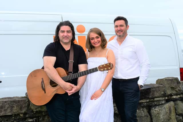 Brian Kennedy with Daisie Conway from Larne and Jonny McKinney from PING, who is sponsoring the gig.