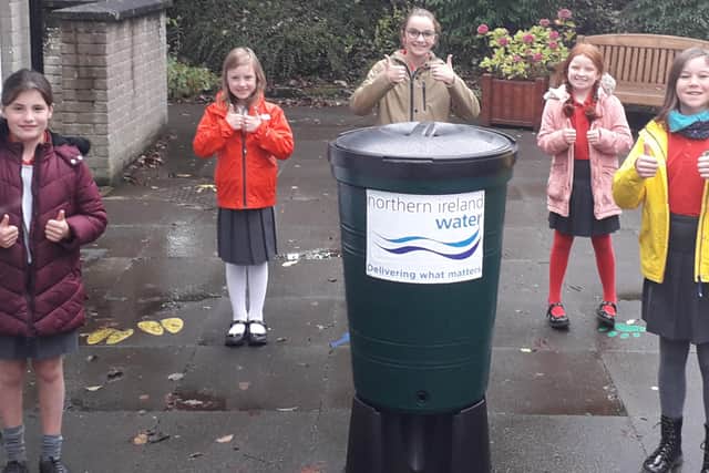 Pictured are pupils with their new Waterbutt