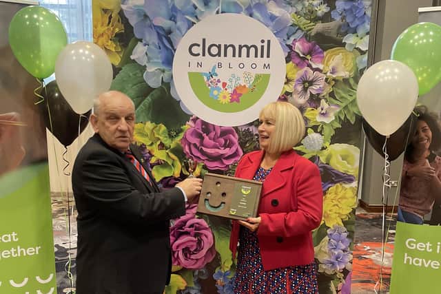 Carol McTaggart, Chief Executive Designate of Clanmil Housing presenting the Award for Star Gardener to Peter Southall at the Clanmil in Bloom Awards