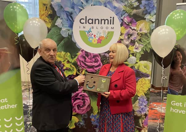 Carol McTaggart, Chief Executive Designate of Clanmil Housing presenting the Award for Star Gardener to Peter Southall at the Clanmil in Bloom Awards