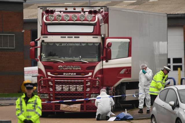 Police and forensic officers at the Waterglade Industrial Park in Grays, Essex, after 39 bodies of Vietnamese migrants were found inside the lorry on the industrial estate