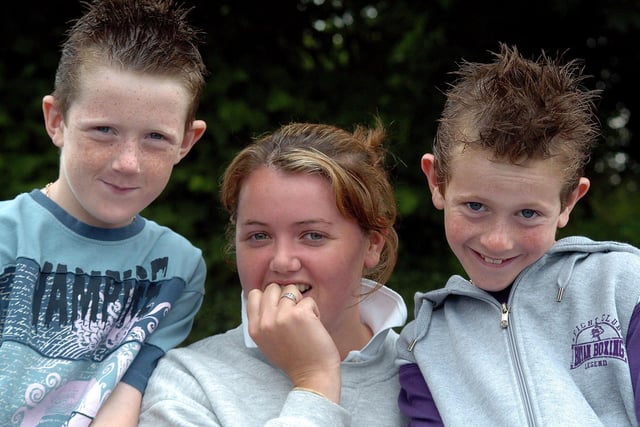 Harry Evans, Grace Doyle and Nathan Evans pose for our lensman at the annual Moneymore Horse Fair in 2007.