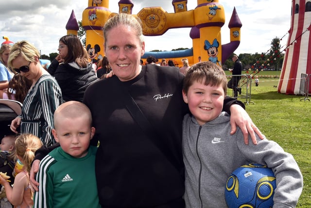 Pictured at the fun day in Portadown People's Park are Emma McVeigh with children, James Devlin (6) and Cathal Devlin (9). PT32-204.