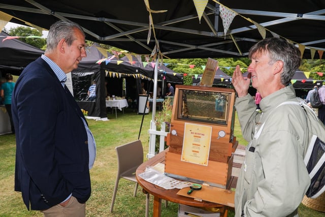 Agriculture Minister Edwin Poots with Alan McMullan from Killinchy Beekeepers at the Honey Fair