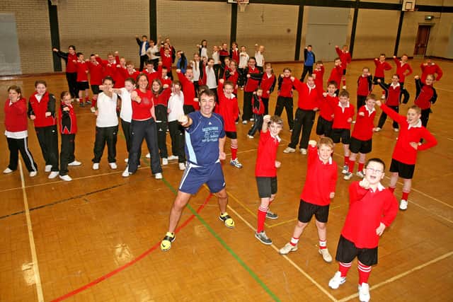 Freddie Kinnersley of Ballygowan Energy Fitness giving a fitness funday to Years 8 and 9 of Ballee Community High. BT47-201AC