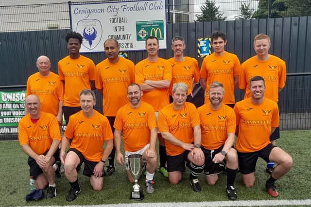 The 'Ould Fellas' who were runners up at the Angela McCabe Cup at Craigavon City FC on Sunday raising funds for the Southern Area Hospice.