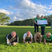 Ballymoney woman Katie Speers is pictured with Macmillan in NI Relationship Fundraising Manager, Jodie McAneaney; Macmillan Causeway Fundraising Group volunteer, Barbara Logan and family of Anna White