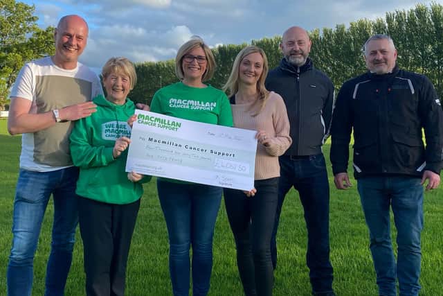 Ballymoney woman Katie Speers (centre) is pictured with Macmillan Causeway Fundraising Group volunteer, Barbara Logan and family of Anna White