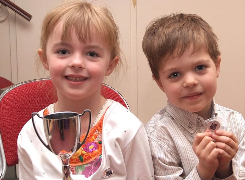 Holding the Challinge Cup is Caitlin Caldwell and runners-up medal Cormac Carr at Portstewart Music Festival back in May 2009