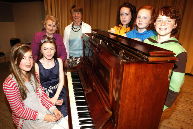 Joan Bell, president, and Margaret Smith, adjudicator, pictured with Carla Armstrong, Jordan Kelly, Karen McLaughlin, Pheobe Ferris, and Alex McLaughlin at Portstewart Music Festival in May 2009
