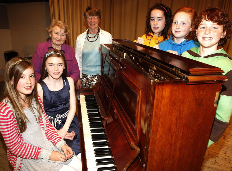 Joan Bell, president, and Margaret Smith, adjudicator, pictured with Carla Armstrong, Jordan Kelly, Karen McLaughlin, Pheobe Ferris, and Alex McLaughlin at Portstewart Music Festival in May 2009