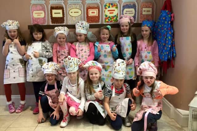 Smiling faces all round: One of Taylor's famous ice-cream invention parties