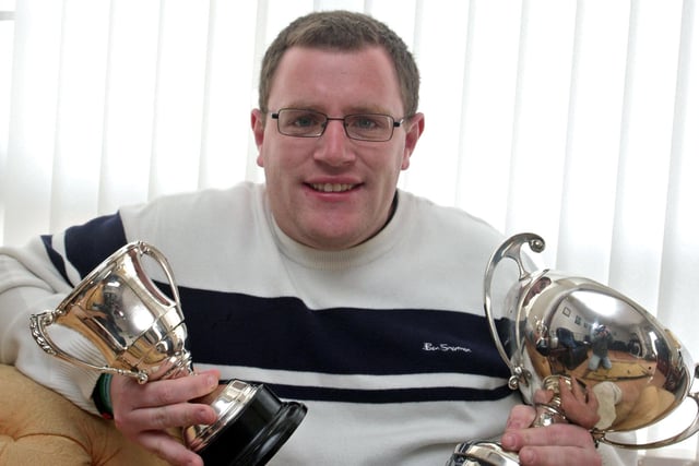 Robert Adams, pictured with the trophies he won  at the Coleraine Music Festival back in April 2010
