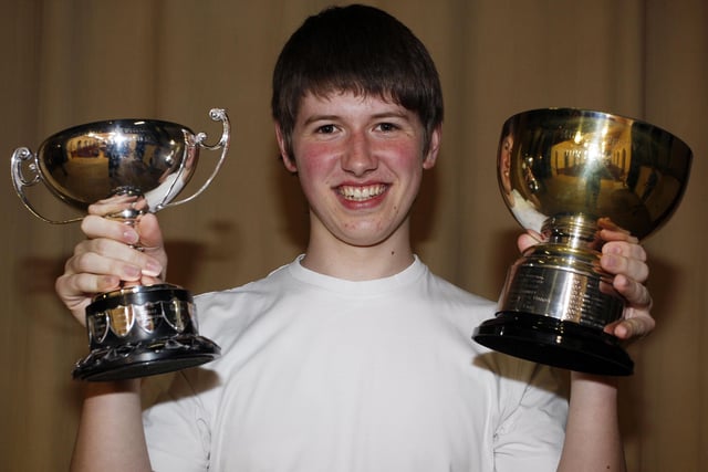 Andrew Collins with his cups at Coleraine Music Festival in April 2010