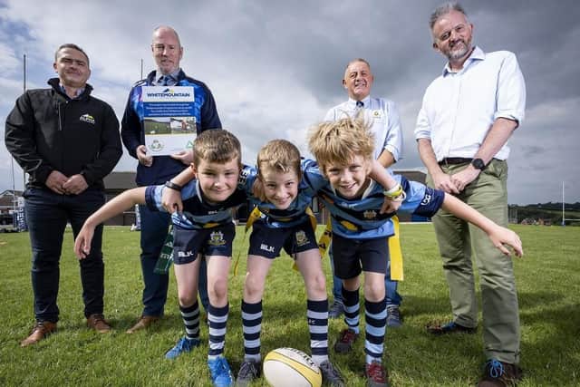 Front row: Eben Mills, Micah Masters and Nathan Currie. Back row: Edward Kearney (Whitemountain Programme); Peter Dickson (Vice Chair, Dromore Rugby Club); Gary Russell (Dromore Barbanians); Richard Rogers (Groundwork)