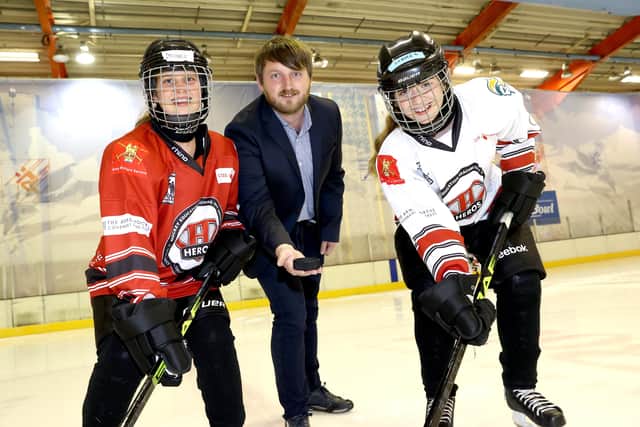 Councillor Aaron McIntyre, Chair of the Leisure & Community Development Committee drops the puck to the start the Big Game at the finale of the HEROS programme at Dundonald International Ice Bowl