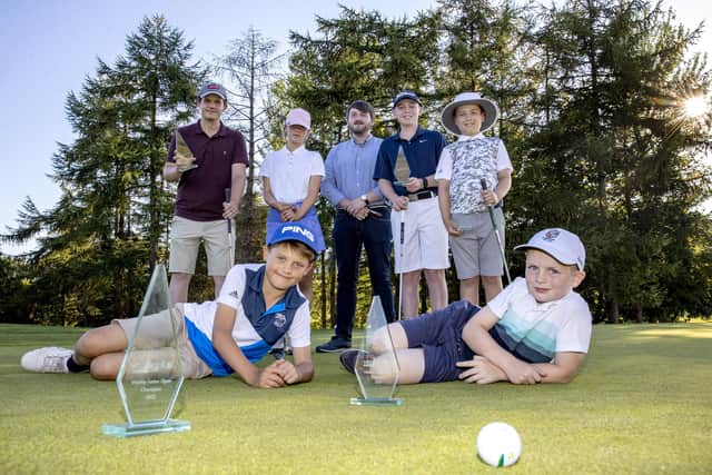 Councillor Aaron McIntyre, Chair of the Leisure & Community Development Committee congratulates the prize winners of the Vitality Junior Open at Castlereagh Hills Golf Course