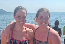 Talented sisters: Jessika is pictured with sister Holly. The sisters both swam in a race from Rostrevor to Warrenpoint, on Saturday, just two days after Jessika's big swim. Jessika won first female skins and Holly won second junior female skins.