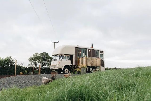 This converted 1968 TK horse lorry has been turned into a luxurious and tranquil space set on a private farmland using repurposed materials and original mahogany floor. The accommodation is suitable for two adults and provides a perfect spot to explore the north coast from. 

Take in your surroundings with the dedicated outdoor space and take a walk to the top of the hill on site to see some spectacular views of Mussenden and Inishowen. The space includes a full size shower, two-ring electric stove and a small oven to make you feel at home. 

thisiscauseway.com/explore/the-oat-box