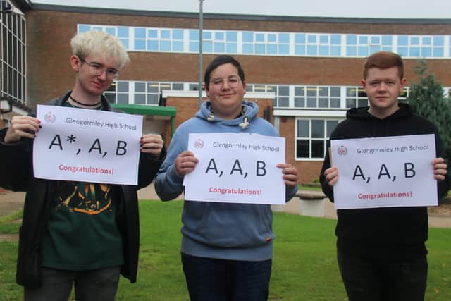 Jay Davidson, Logan Hodder and Stuart Melville on A Level results day.