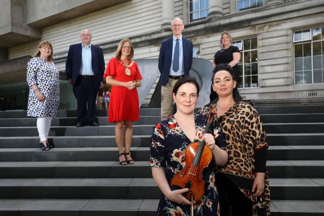 Jackie McCoy, Chairman of Belfast International Arts Festival (BIAF), William Leathem, Vice-Chair of Arts Council Northern Ireland, Councillor Christina Black, Lord Mayor of Belfast, Richard Wakley, Chief Executive and Artistic Director of BIAF and Siobhan McGuigan, Events Development Manager at Tourism Northern Ireland with violinist Joanne Quigley McParland and pianist Ruth McGinley at the BIAF22 launch at Ulster Museum