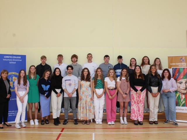 Loreto College Principal, Miss Belinda Toner, congratulates the students who achieved three A grades or better at A Level