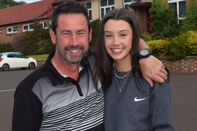 CGS pupils Katie McLaughlin celebrating with her father after achieving an A star and two As