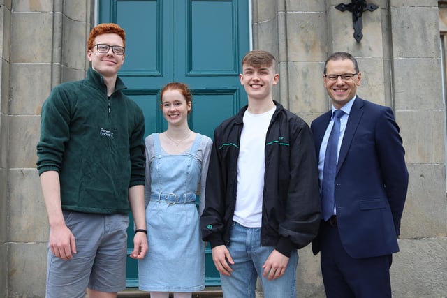 Daniel Moore Four A* grades gaining a place at Pembroke College Cambridge, Erin Colgan Four A* grades, and Charlie Porter Four A* grades gaining a place at University of Bathe pictured with Principal Robin McLouglin