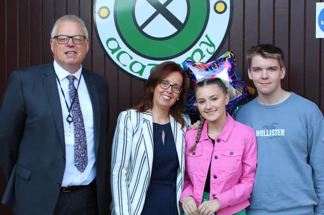 Michael Keenan CCMS, St Patrick's Academy Principal Grainne McCann with Tierna and Max on receiving their results.