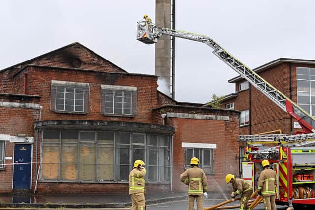 26th August 2022
Fire crews pictured at a blaze in a disused building at the rear  of Southern Regional College in Lurgan ..

Mandatory Credit  Stephen Hamilton/ Presseye