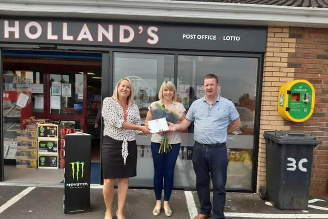 Post Office area manager, Karen Munn, Derrymacash Post Office manager Deirdre McCorry and Derrymacash postmaster, Terence Mulholland