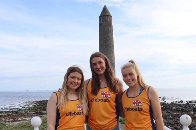 Causeway Coast lifeguards Millie, Abigail and Olivia who raised funds for RNLI