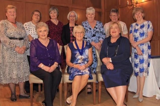Muckamore WI committee pictured at its 70th Anniversary dinner in Dunadry Hotel, Templepatrick. Back row, from left: Joan Gray, Irene McCullough, Mary Taylor, Lynda Brown, Laureen Fisher, Joan Hamilton and Jean McCollam, PR officer.. Front row, from left: Lesley Allen, treasurer; Elizabeth Gray, president; and Sharon Carson, secretary. Picture: Julie Hazelton