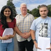 St Patrick’s College Principal, Dr Martin Knox, with (l-r) Augusteena Augustine and Cristian Pavel. Augusteena and Cristian have achieved two of the school’s highest average scores across all of their GCSE grades, with most of their results achieved at A* or A grade.