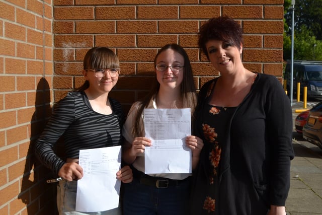 Laurehill student Emily Rose celebrates with mum and sister Amy after achieving 4A stars, 2As and a B and C at GCS