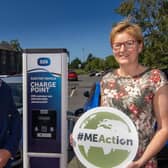 Mayor of Mid and East Antrim, Alderman Noel Williams and Elaine Smith Council's Climate and Sustainability Manager at one of the electric vehicle charge points in Larne.
