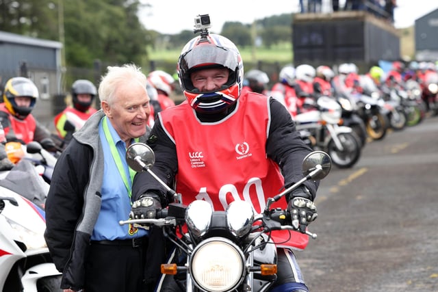 Mayor of Lisburn and Castlereagh City Council, Councillor Scott Carson with Des Stewart, Chairman of the Ulster Grand Prix Supporters Club as he led the lap of 100 bikes during the Ulster Grand Prix Centenary Day at Dundrod.
PICTURE BY STEPHEN DAVISON