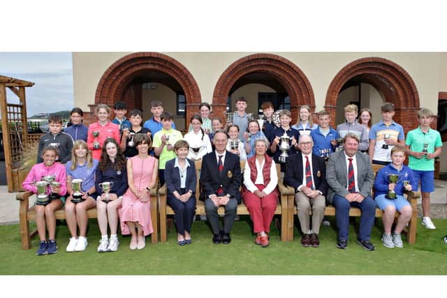 Royal Portrush Junior champions with girls’ convenor, Elaine Cameron (front row left); Roma English; Ashley Moore; Kath Stewart-Moore; Sir Richard McLaughlin and boys’ convenor, Richard Beggs.