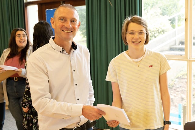 Mr Marsh presents Head Girl Ruth Cromie with her GCSE results